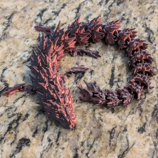 Articulated 3D-printed dragon made by DeSmit Designs